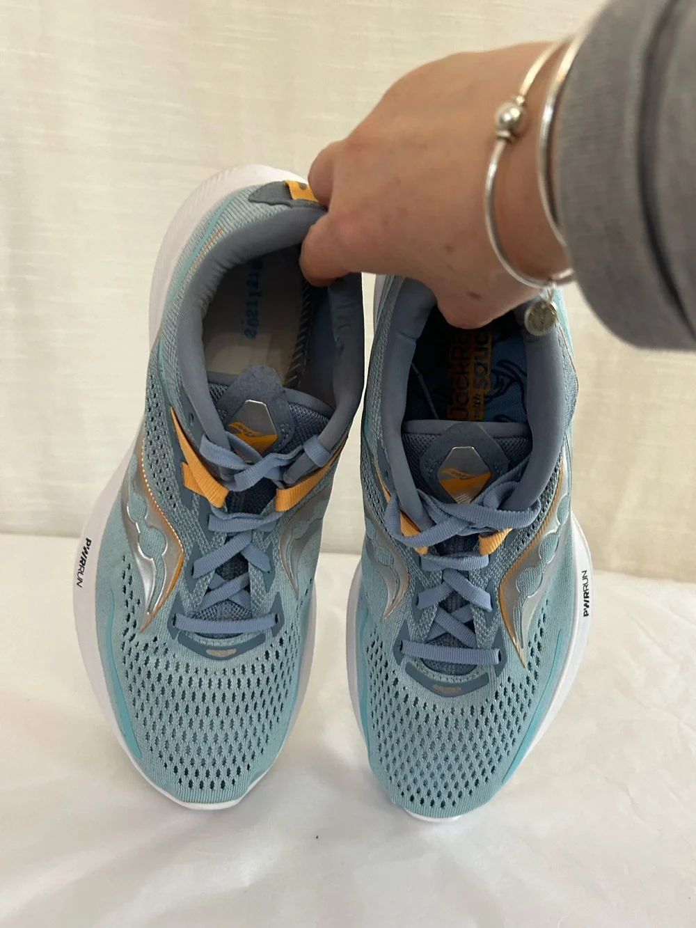 Saucony Ride 15 Women's Light Blue Athletic Sneakers with Yellow Accents